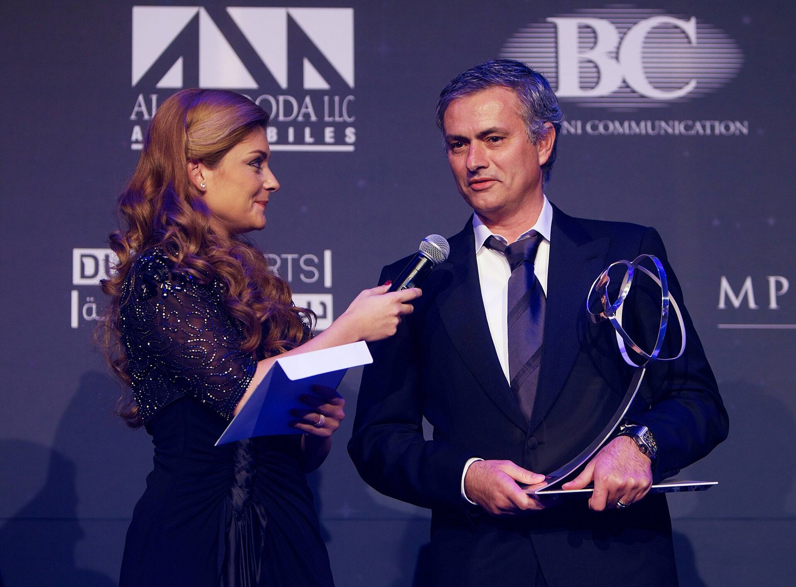 Jose Mourinho holding an award at Globe Soccer Awards 2012